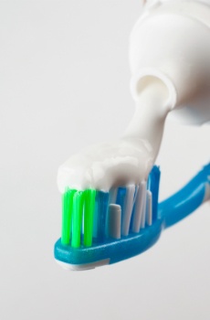 putting_toothpaste_on_brush