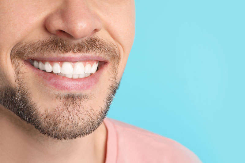 dental patient smiling after gum disease treamtent
