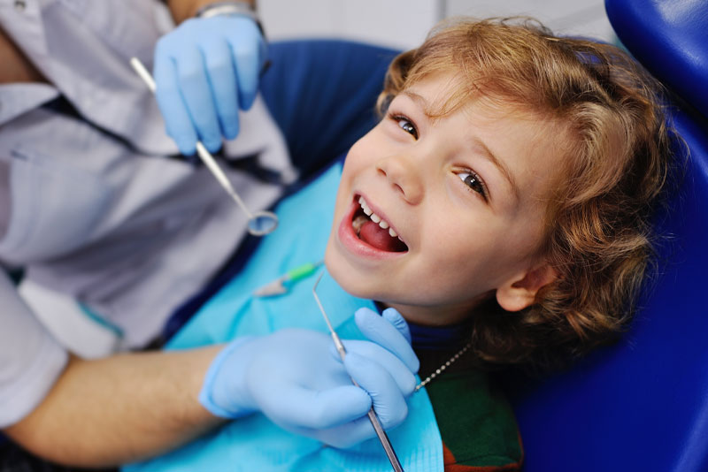 young dental patient smiling
